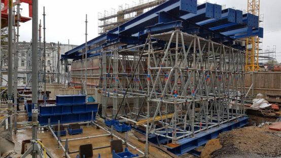 Referenzprojekt: Ingenieure Tomshöfer & Partner (Ausschnitt Traggerüstkonstruktion, Bauteil Schwerlaststütze, Mischbauweise aus Modul,- und Stahlbauteilen)